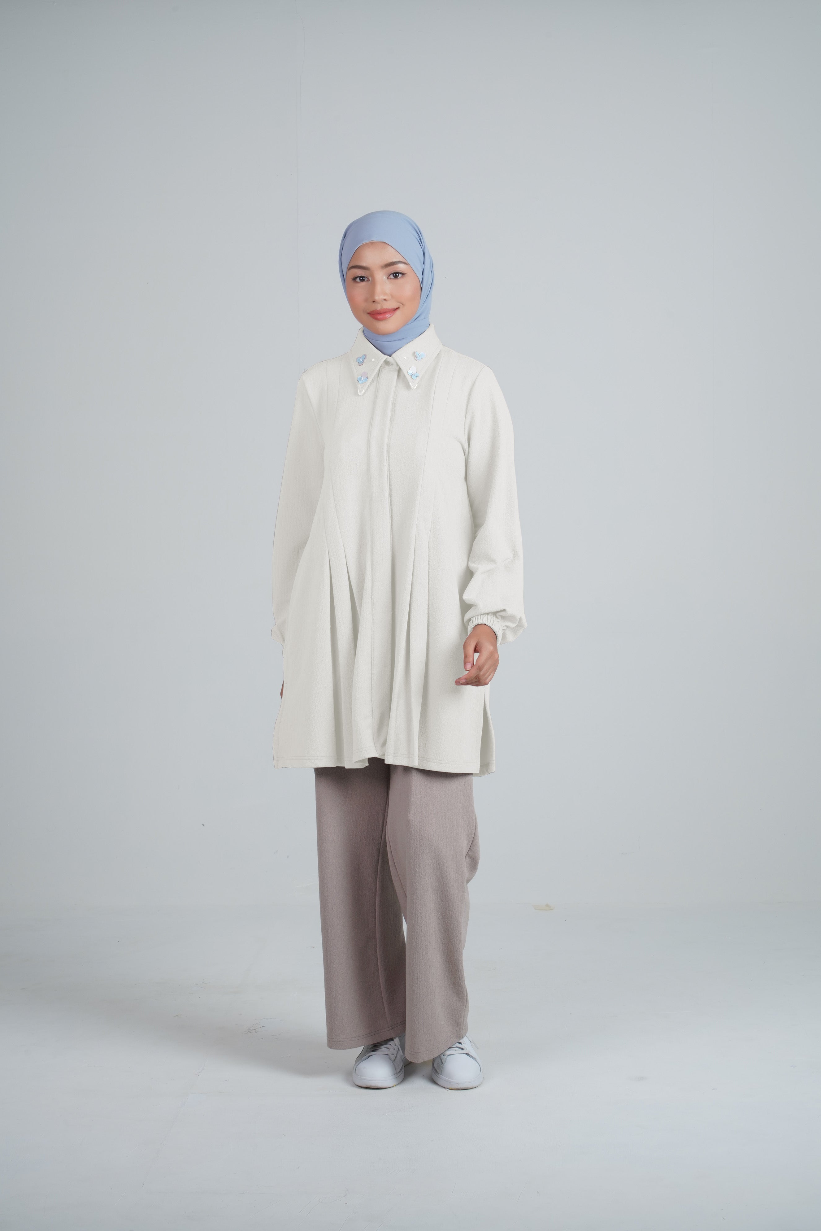 L TUNIC PLEATED SEQUIN